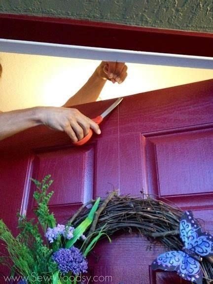 How To Hang A Christmas Wreath Without Damaging Your Door In 2021 Diy