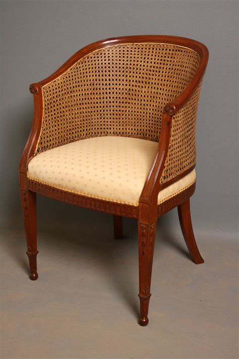 A piece of furniture for one person to s.: Late Victorian Bergere Chair In Mahogany - Antiques Atlas
