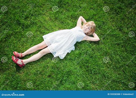 Young Girl Lying On Grass Stock Photo Image Of Green 55558388