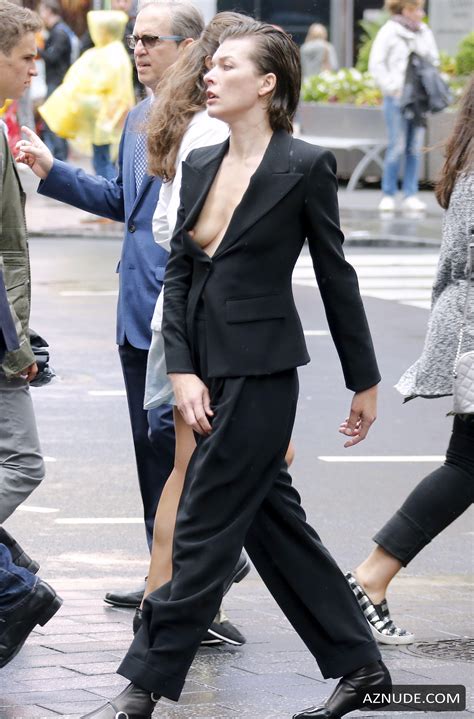 Milla Jovovich Nip Slip in Photoshoot by Peter Lindbergh forÂ Vogue