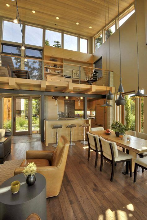 Beautiful Lakefront House With Large Windows Surrounded By Gorgeous