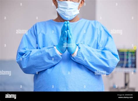 Doctor, praying and hands with healthcare and surgery, seek guidance