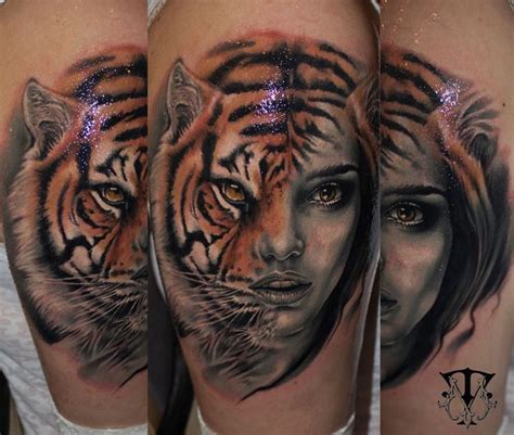 A Womans Face With Two Tigers On Her Thigh