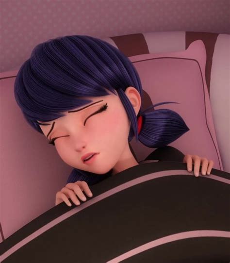 A Woman With Blue Hair Laying In Bed Next To A Pink And Black Wallpaper