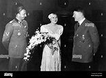 HERMANN FEGELEIN (1906-1945) at left with his new wife Gretl Braun ...