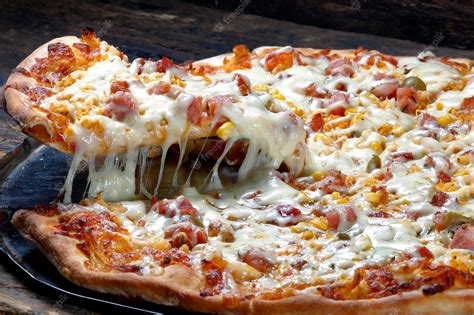Fatia De Pizza Com Queijo Derretido Foto Premium