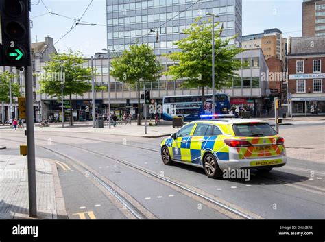 Police Car Driving Through Nottingham City Centre Nottinghamshire