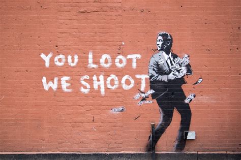 Banksy was born in c. "You Loot, We Shoot" by Banksy in New York City ...