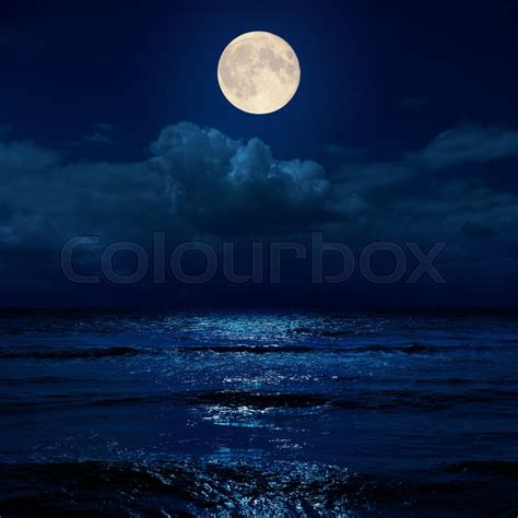 Full Moon In Night Over Clouds And Sea Stock Image Colourbox