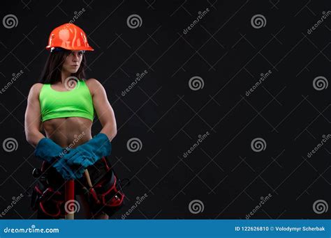 Female Miner Worker With Pickaxe In Coveralls Over His Naked Body