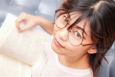 Women Wear Glasses Reading Book On Cozy Sofa Stock Image Image Of