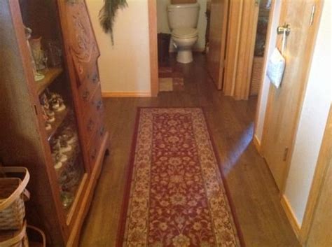 Vintage tobacco oak's cool neutral brown color with amber tones will fit in almost any home decor. Pergo Outlast+ Auburn Scraped Oak 10 mm Thick x 6-1/8 in ...