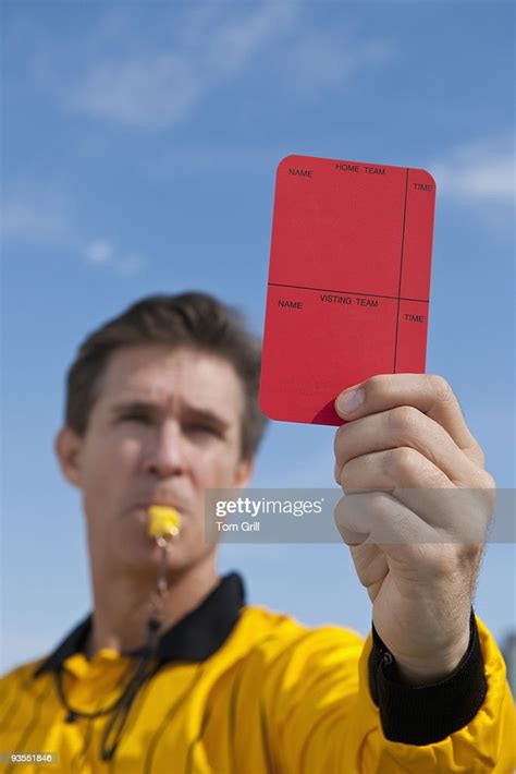 Soccer Referee Holding Red Card High Res Stock Photo Getty Images