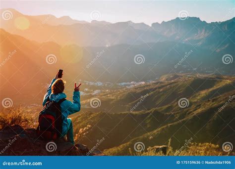 Happy Tourist Making Selfie In Mountains Hiking In Nature Stock Photo
