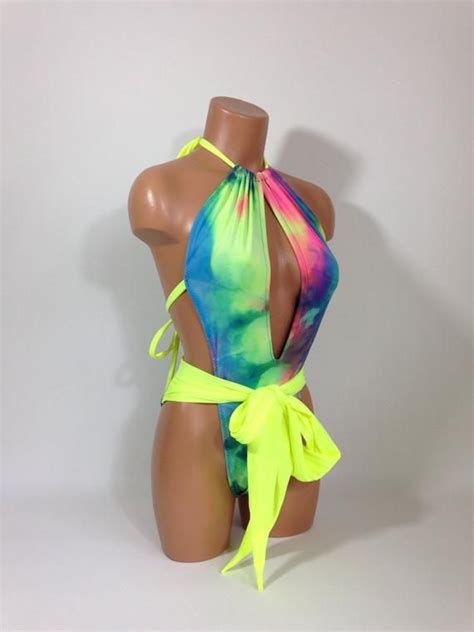 A swirling rainbow of uncool, it has a tendency to leave wearers resembling something that stumbled out of a tent at woodstock in a cloud of smoke. One-piece swimsuit women's neon tie dye wrap monokini ...