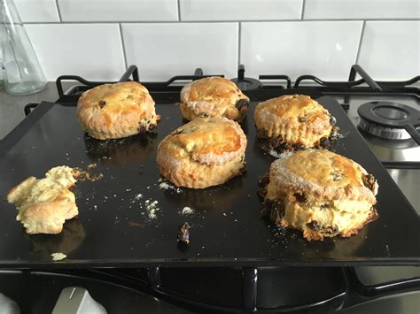 success! Finally made rich fruit scones that have risen (a bit) have