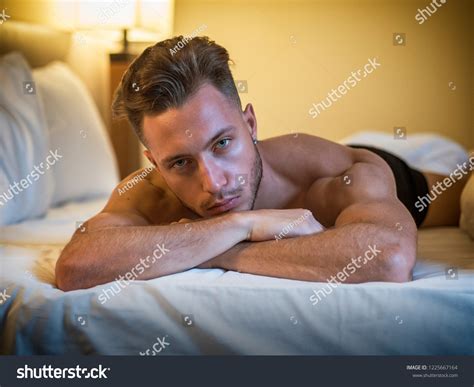 Shirtless Sexy Male Model Lying Alone Stockfoto Jetzt Bearbeiten 1225667164