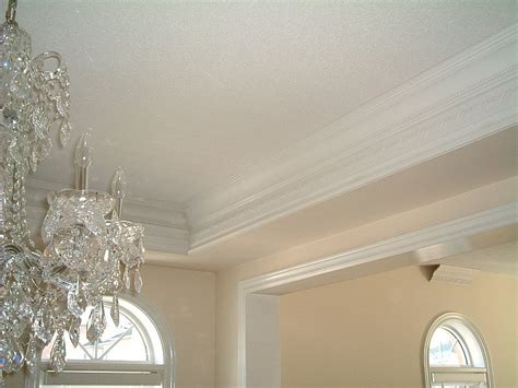 The coffered ceiling with lighting behind all crown mouldings with a pot light in the centre of each square turns your basement or any room in your house into a very luxurious beautiful space, that will wow everyone, every time. Coffered Ceilings Gallery I Elite Trimworks