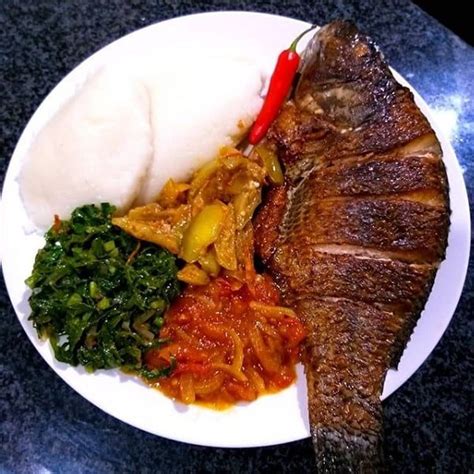 Zambian Nshima With Fish And Veggies Zambian Kitchen Zambian Food