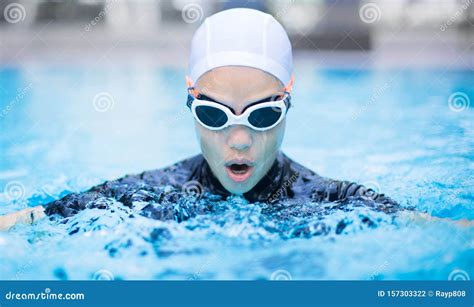 Professional Female Swimmer Lap Training In The Pool Stock Photo