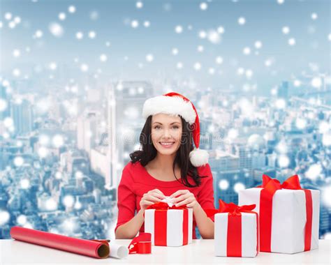Smiling Woman In Santa Helper Hats Packing Ts Stock Image Image Of