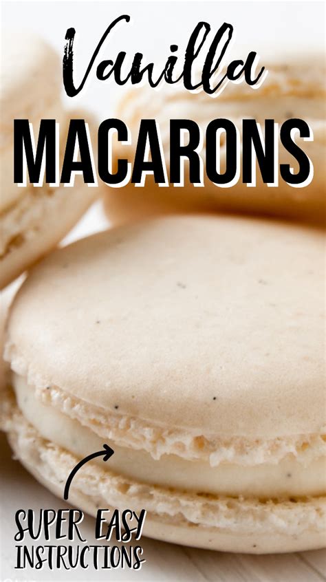 Vanilla Macarons Are Stacked On Top Of Each Other