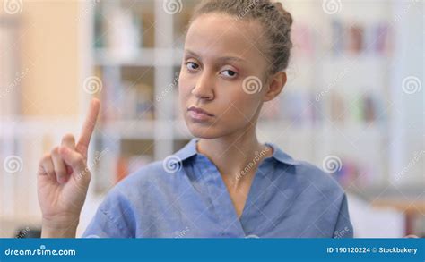 Portrait Of Attractive African Woman Saying No By Finger Stock Footage