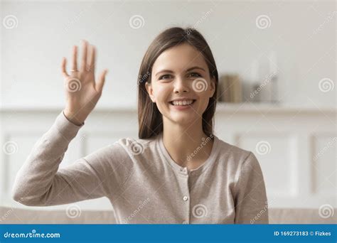 Head Shot Portrait Smiling Beautiful Young Woman Waving Hand Stock