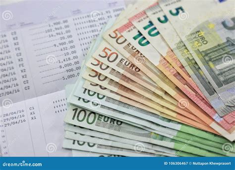 Many Euro Banknotes And Bank Account Passbook Show A Lot Of