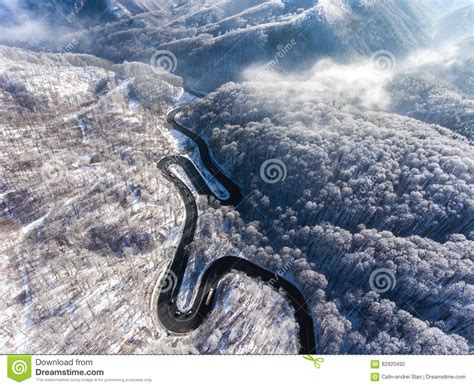 Aerial Drone View Of A Curved Winding Road Through The