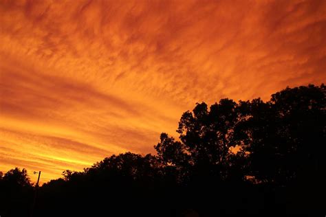 Orange Storm Clouds Photograph By Karen Silvestri