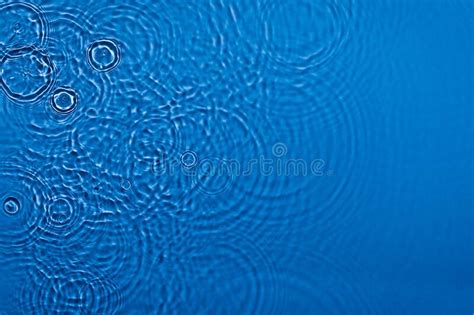 Transparent Dark Blue Colored Clear Calm Water Surface Texture Stock