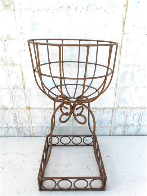 What are the shipping options for iron plant stands? 29" Vintage Wrought Iron Bowl Plant Stand