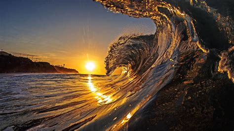 Download Waves On Beach During Sunset Wallpaper
