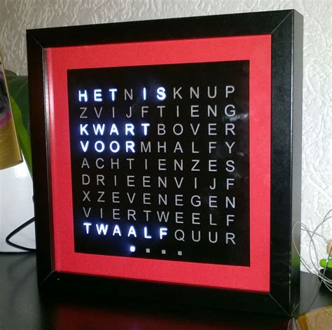 This word clock thing is interesting. Sleek Word Clock | Clock, Electronics projects, Words