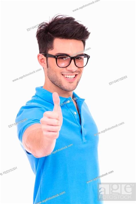 Young Casual Man Making The Ok Thumbs Up Hand Sign On White Background
