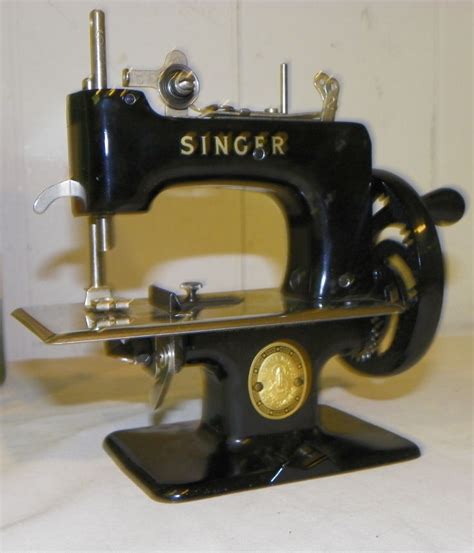 New machine models added daily. Bargain John's Antiques | Antique Singer Sew Handy Model ...