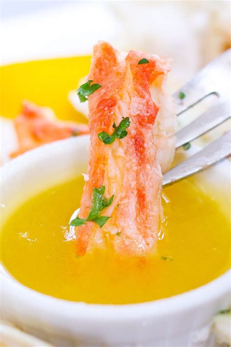 Add as many crab legs as your pot will accommodate and still close the lid tightly. Dipping crab legs in clarified butter. | Crab legs recipe ...