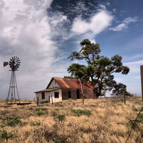 Abandoned House And Windmill On The Prairie In Western Oklahoma Farm