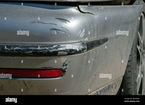 Damaged Rear Bumper Close Up Cracked Gray Bumper Car Accident