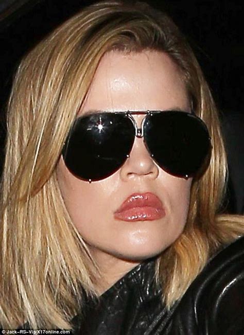 khloe kardashian shows off plumped up lips as she visits lamar odom daily mail online