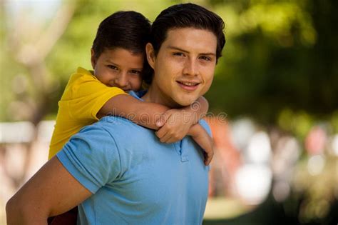 Son His Father Holding His Son High Res Stock Photo
