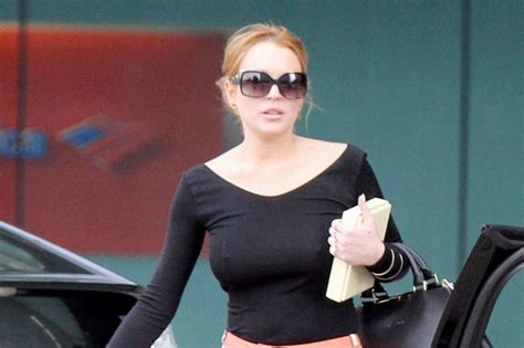 Lindsay Lohan S Nipples Poke Through Her Top As She Goes Out Without A