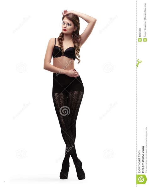 Het Sexy Meisje In Zwarte Nylonkousen En De Bustehouder Zitten Op Stoel