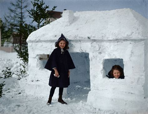 Two Girls Standing Outside Of A Snow Fort Ca 1910 By