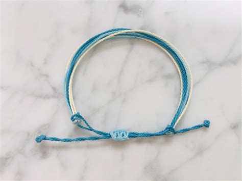 How To Make A String Bracelet Adjustable How To Tie A Slide Knot To