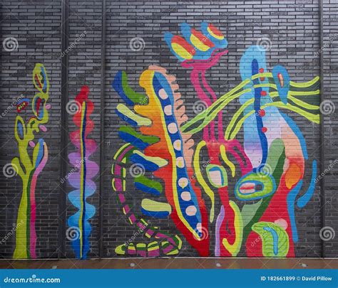 Colorful Abstract Mural By Mariell Guzman On The Outside Of A Building