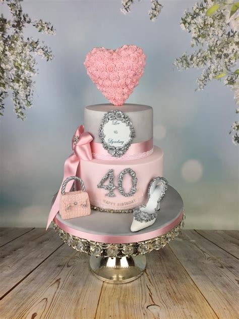 When it comes to buying 40th birthday gifts for her, you want to avoid the whole negative aspect and focus on the good stuff. Romantic pink and silver engagagement /40th cake | 40th birthday cake for women, 40th birthday ...