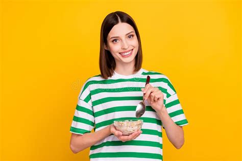 Photo Of Cute Brunette Millennial Lady Eat Breakfast Wear Striped T