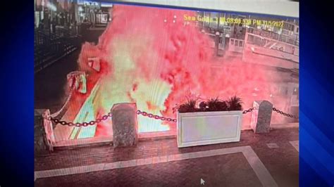 bpd officer stuck by needle while trying to restrain a man who fired flares outside boston hotel